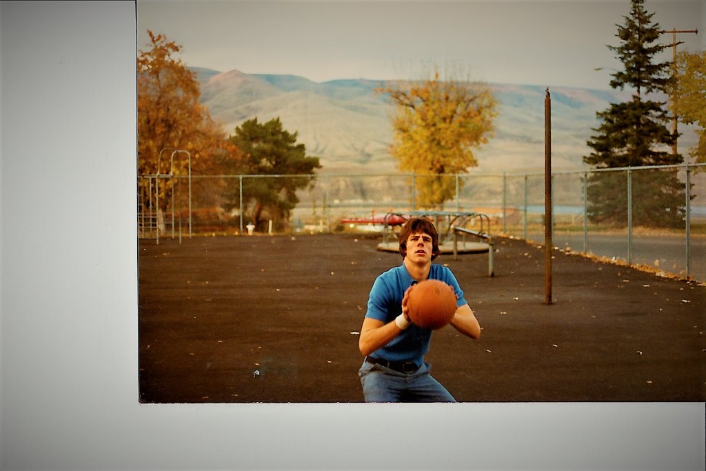 Mark Trigsted shooting freethrows at the St. Stans 9-foot hoop, across the street from Bredablik, (my house), Autumn 1975